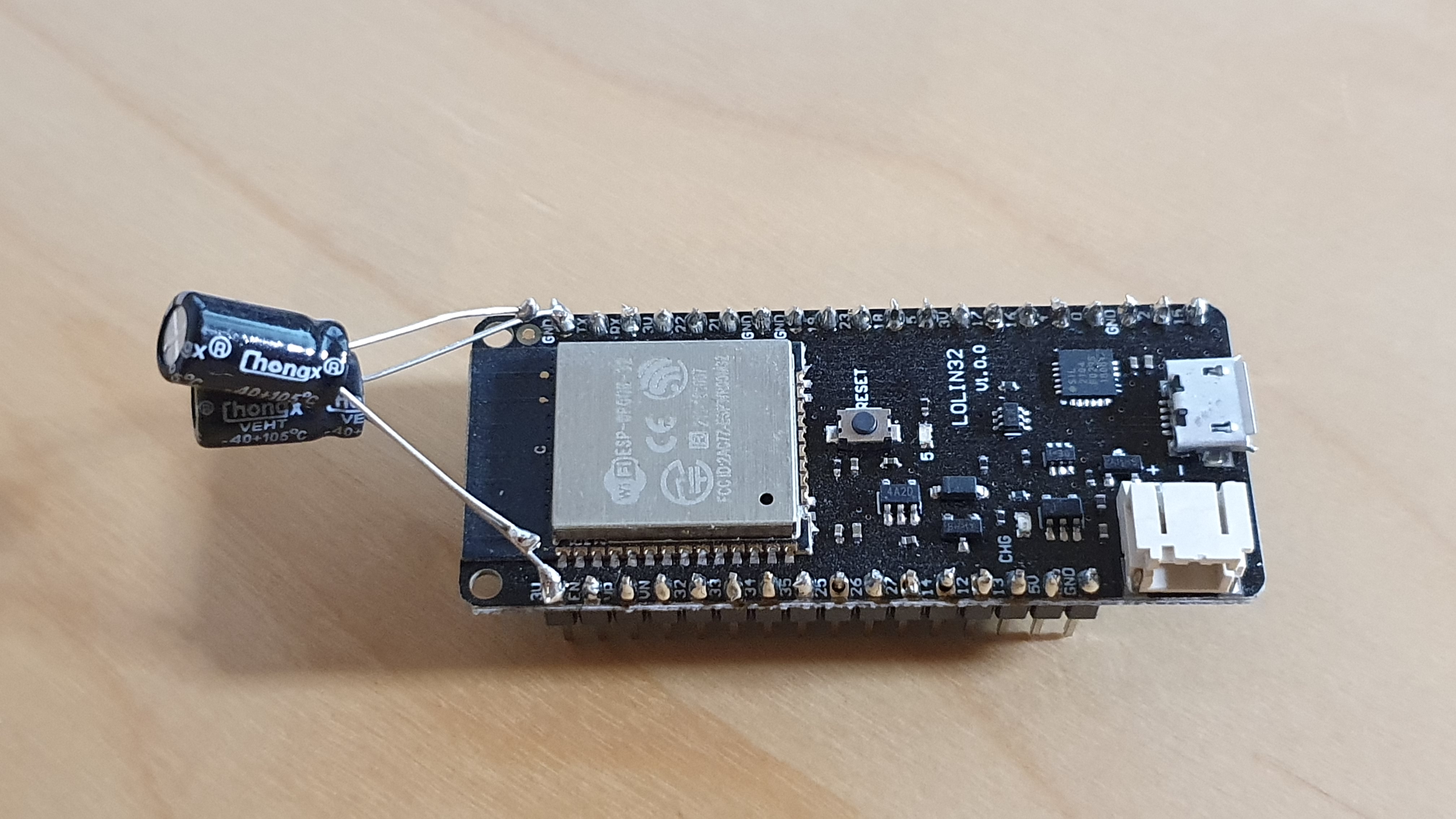 ESP32 with two 470 µF capacitors